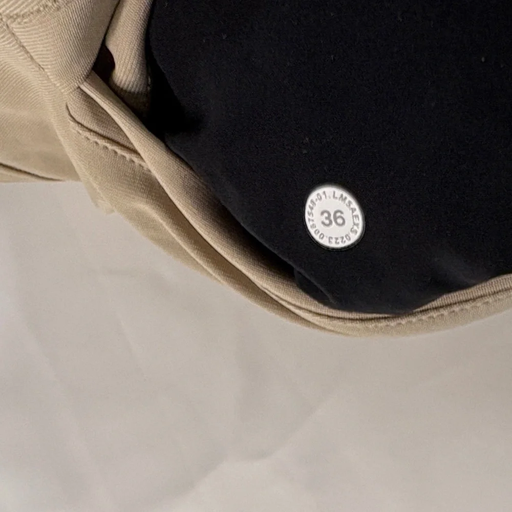 LULULEMON SLIM-FIT TROUSER SIZE 36 WARPSTREME.